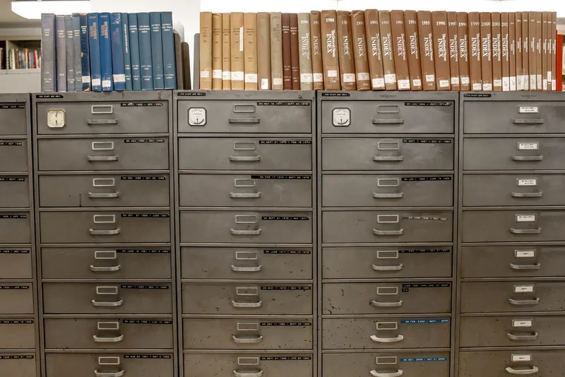 Rows of filing cabinets with indexed folders