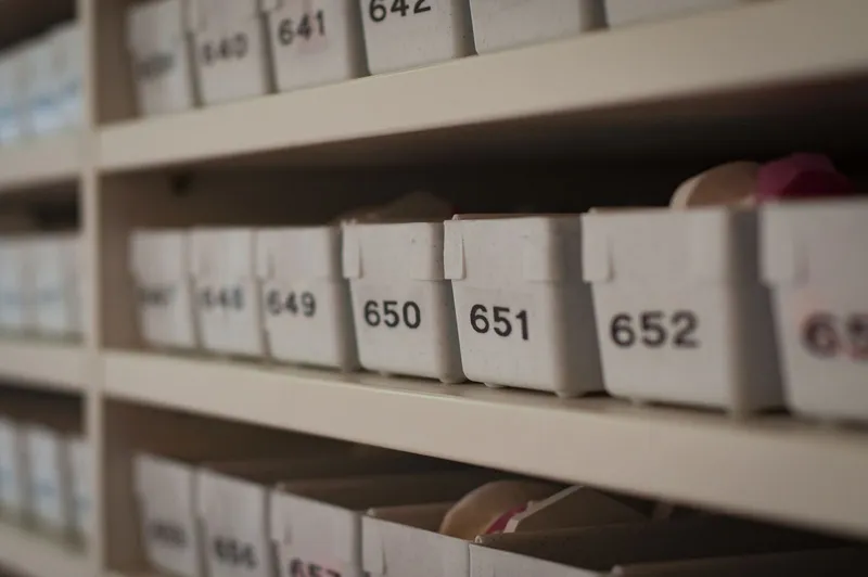Numbered storage boxes on shelves