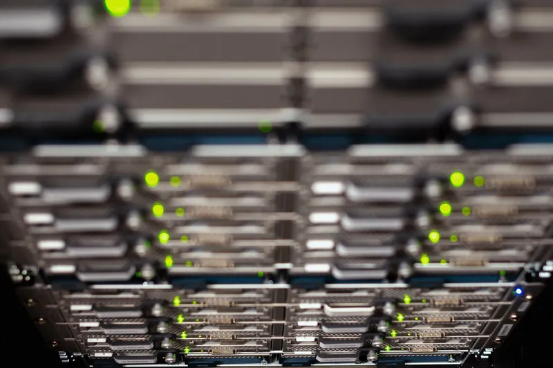 Overhead view of empty cable trays in a data centre